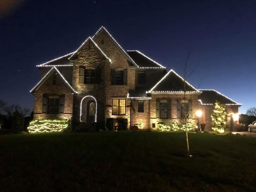 Christmas light installation by Thin Red Line Holiday Lighting