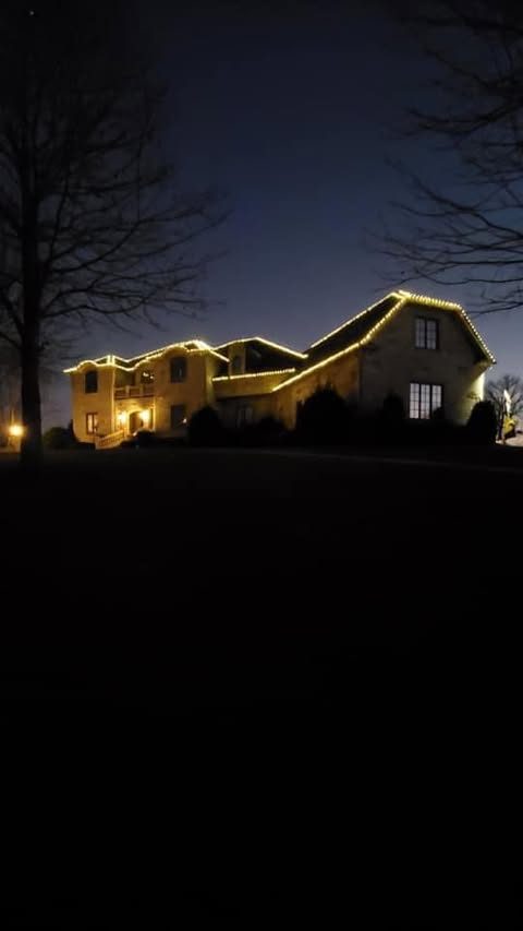 Christmas light installation by Thin Red Line Holiday Lighting