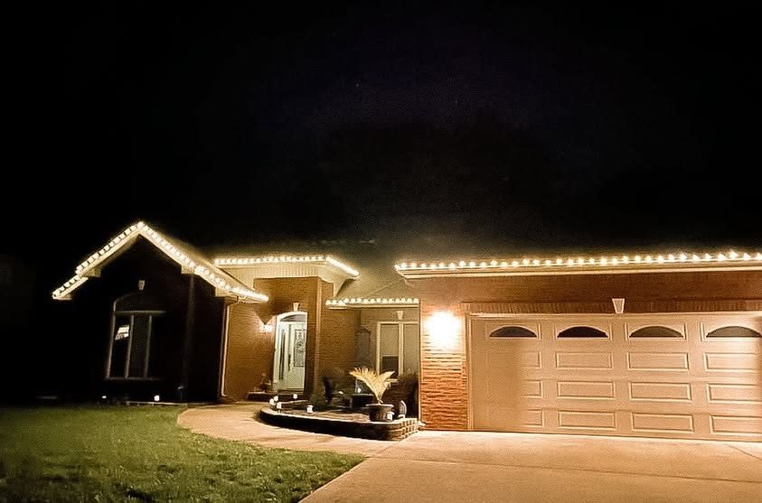 Christmas light installation by Thin Red Line Holiday Lighting
