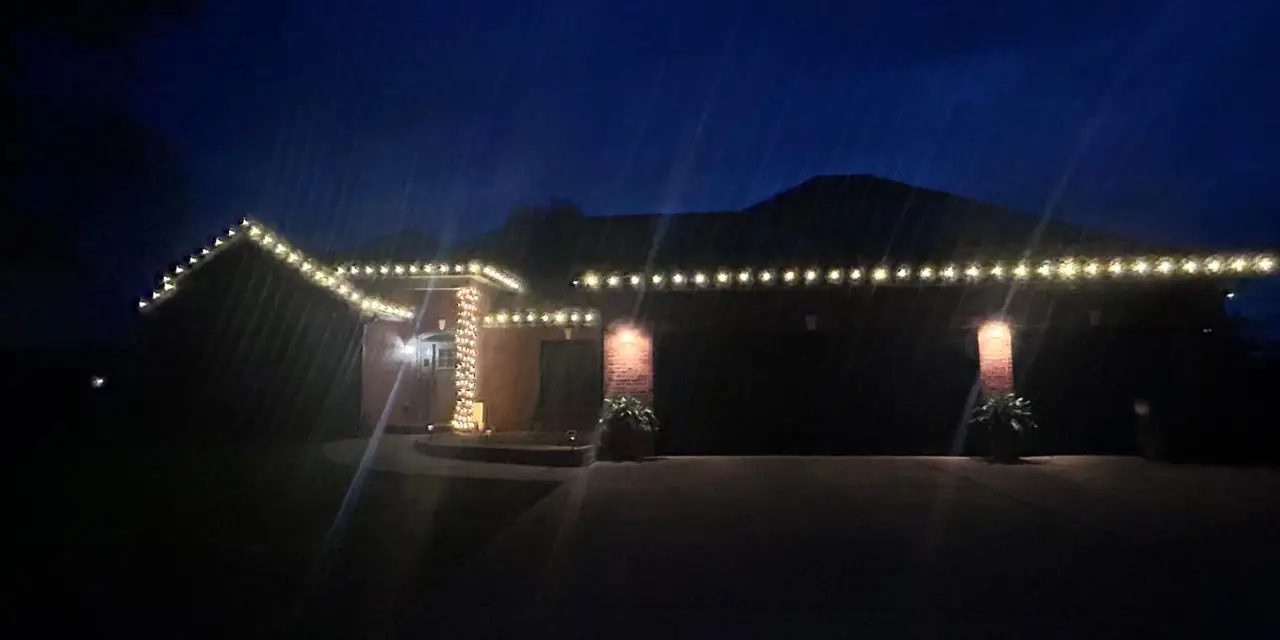 Christmas light installation by Thin Red Line Holiday Lighting
