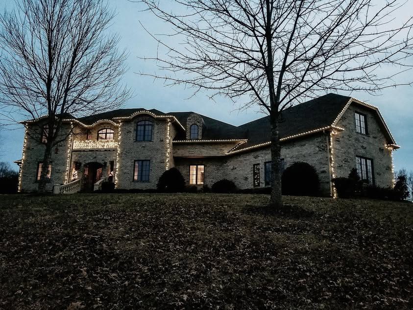 Christmas light installation by Thin Red Line Holiday Lighting